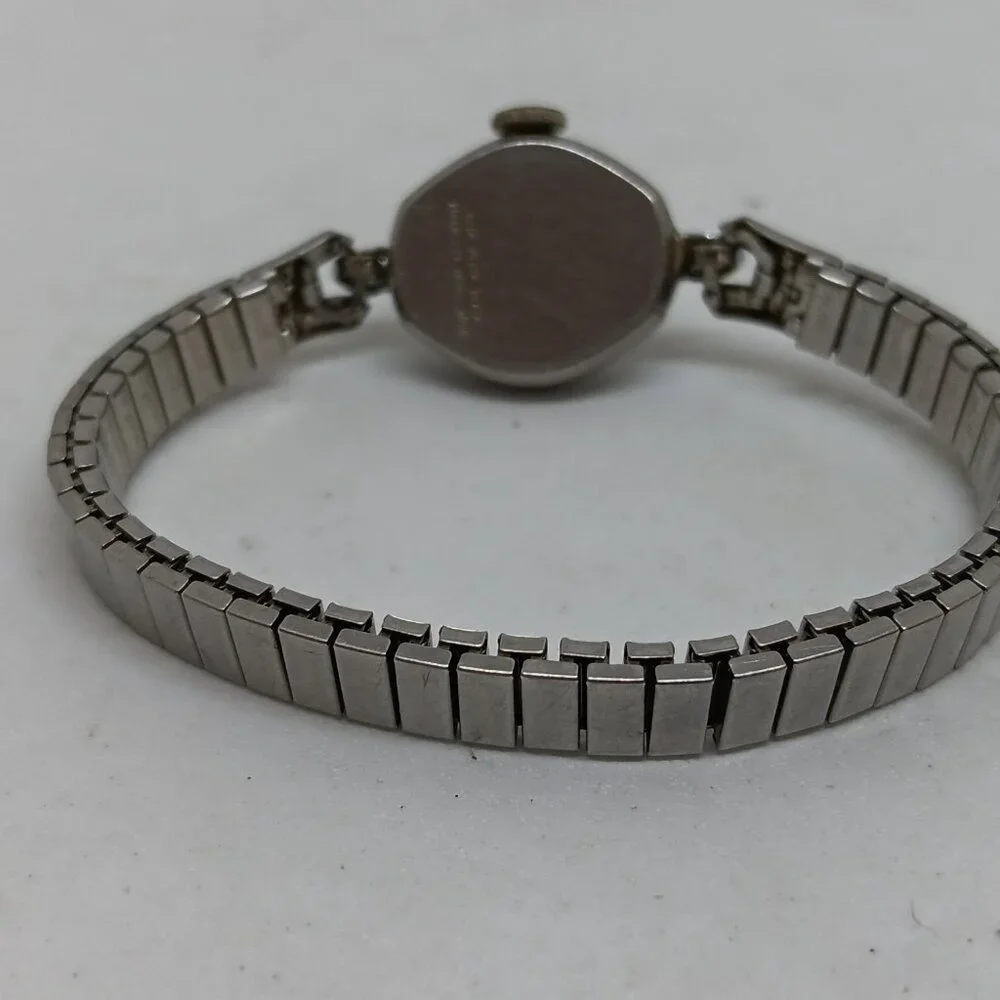 VINTAGE Timex Manual Wind Women's 17 mm Silver Tone Cocktail Flex Band Watch